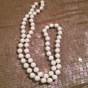 Ladies long white and gold necklace